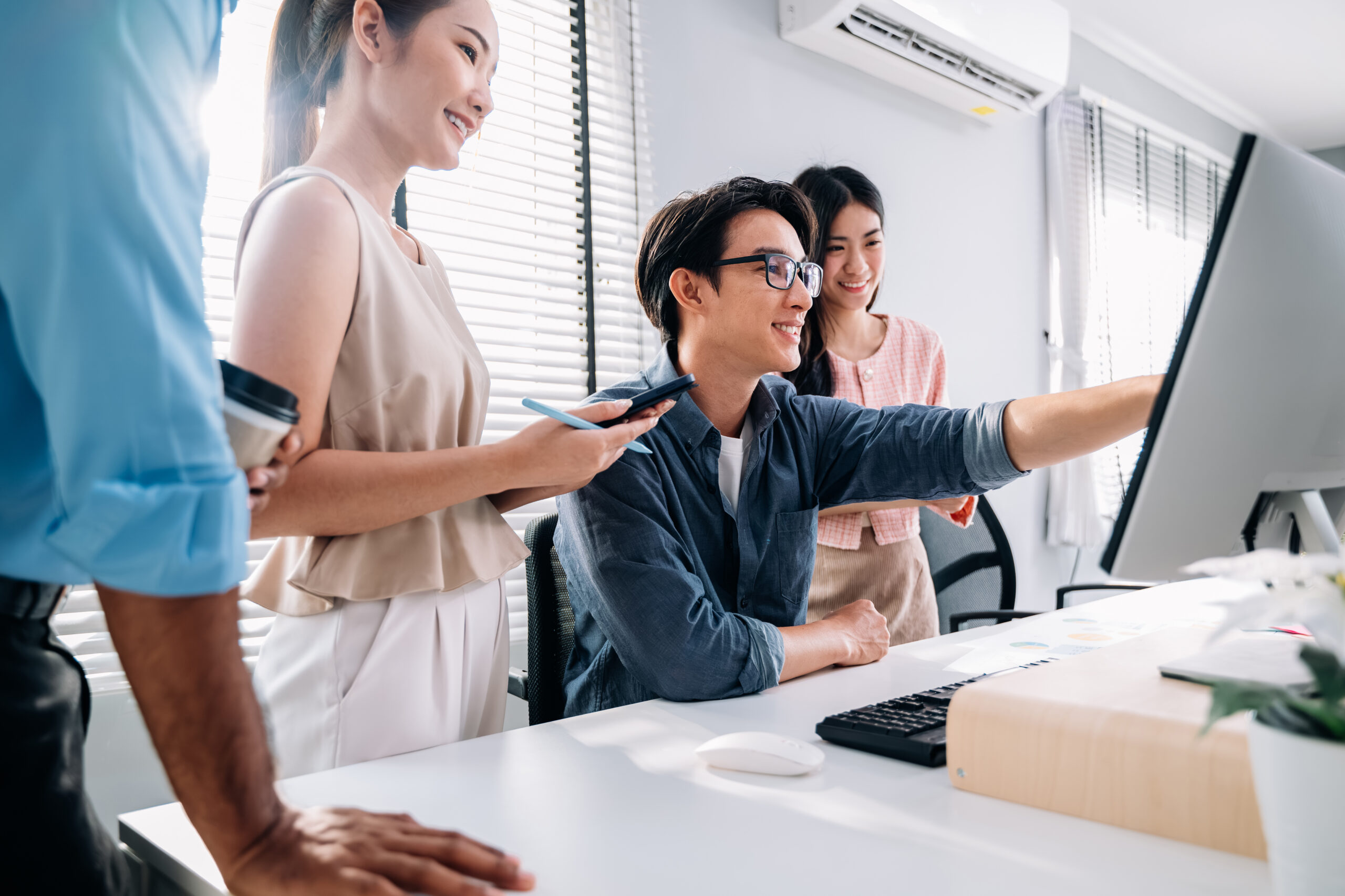 Group of business people working together at modern office, Business team meeting and brainstorming at company, Employees using laptop working with business project